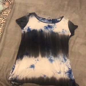 A tie die tee shirt with an open back